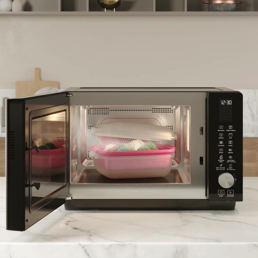 Whirlpool JC 218 BL Jet Cook Forno microonde con grill a libera installazione cm. 55 - nero