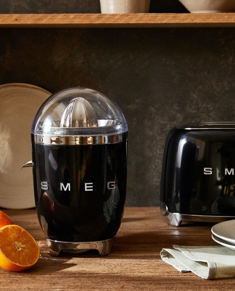 Smeg Selection CJF11BLEU 50's Style Spremiagrumi - nero lucido