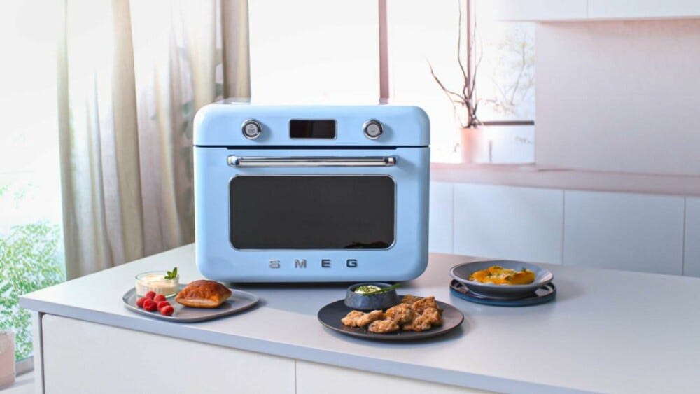 Smeg Selection COF01PBEU 50'S Style Forno combinato a vapore da appoggio cm. 50 - azzurro lucido