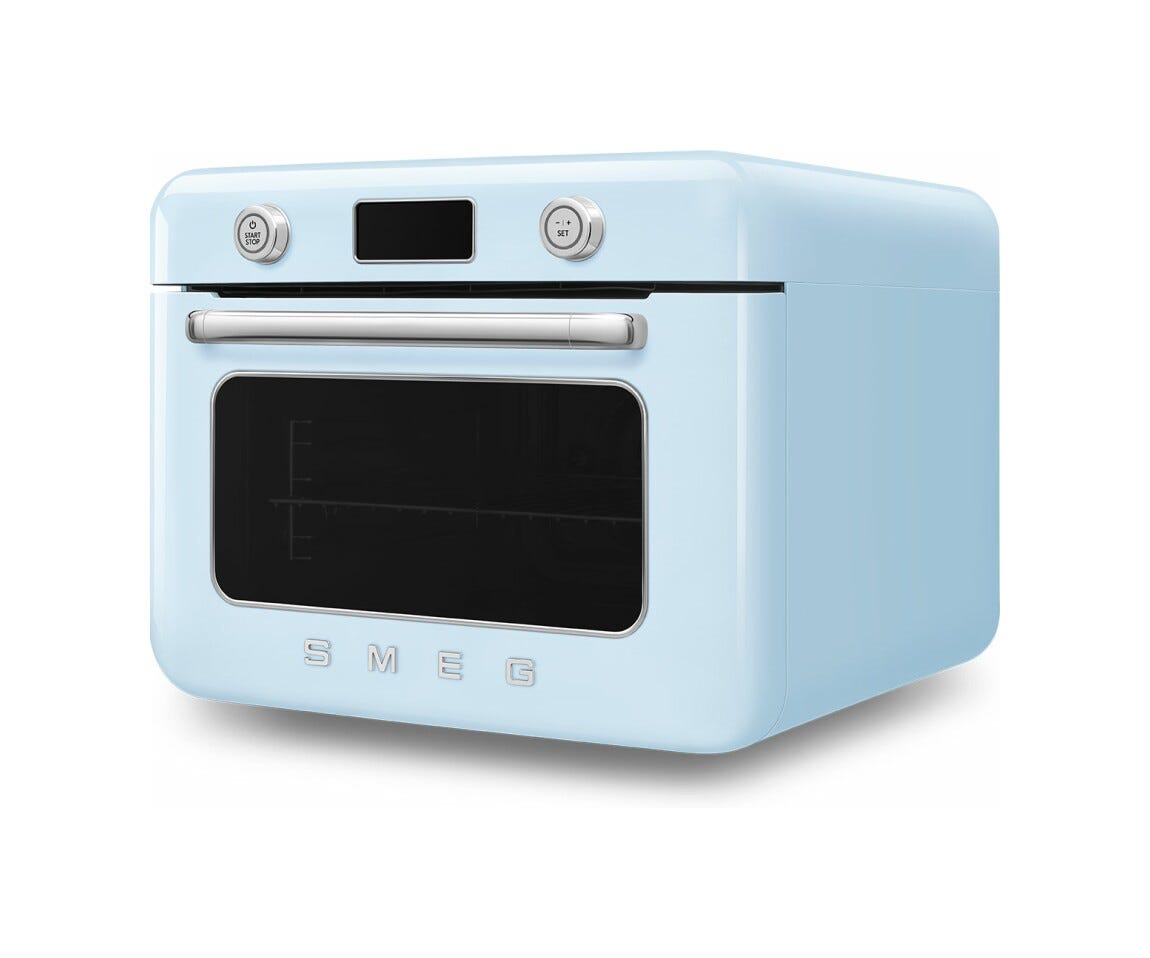 Smeg Selection COF01PBEU 50'S Style Forno combinato a vapore da appoggio cm. 50 - azzurro lucido