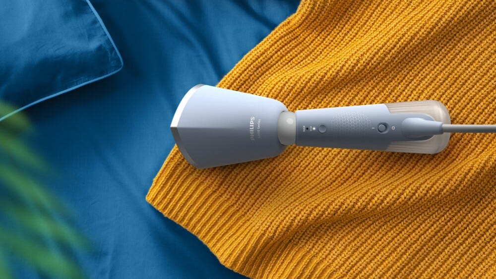 Philips STH5020/20 Sistema di stiratura a vapore portatile, pronto in 35 secondi, per risultati professionali.
