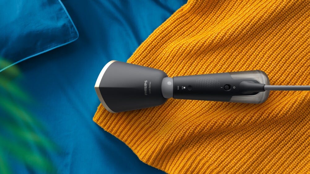 Philips STH5030/80 Ferro da stiro verticale a vapore portatile, pronto all'uso in pochi secondi, elimina fino al 99,9% di batteri e acari.