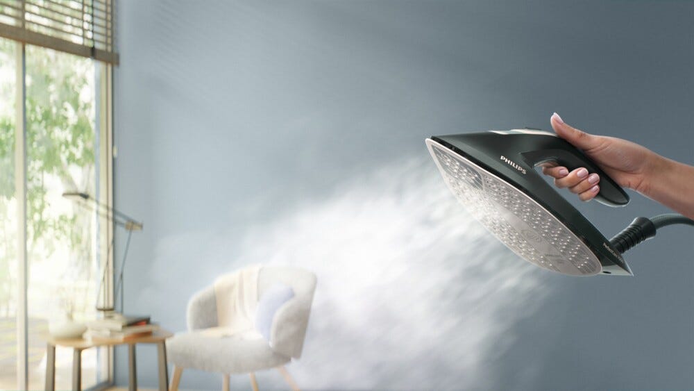Philips PSG7300/20 Centro di stiratura con vapore automatico e tecnologia OptimalTEMP per una stiratura senza bruciature.