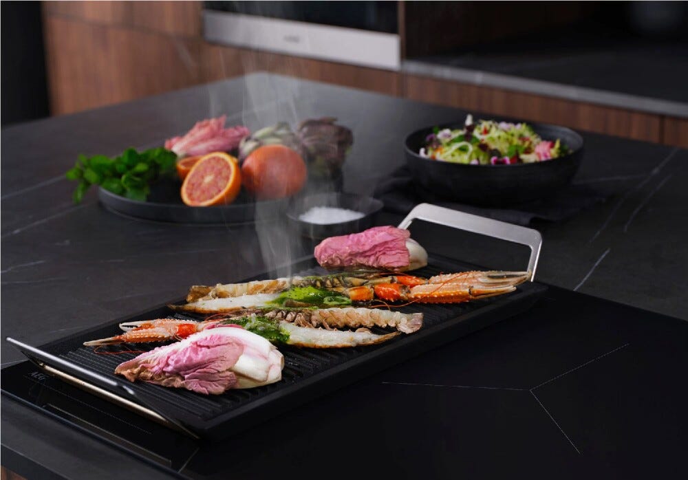 AEG TO74IB00UB serie 6000 Piano cottura a induzione, cm. 70, 4 zone cottura, Hob²Hood, Flex Bridge, cornice inox, vetro nero